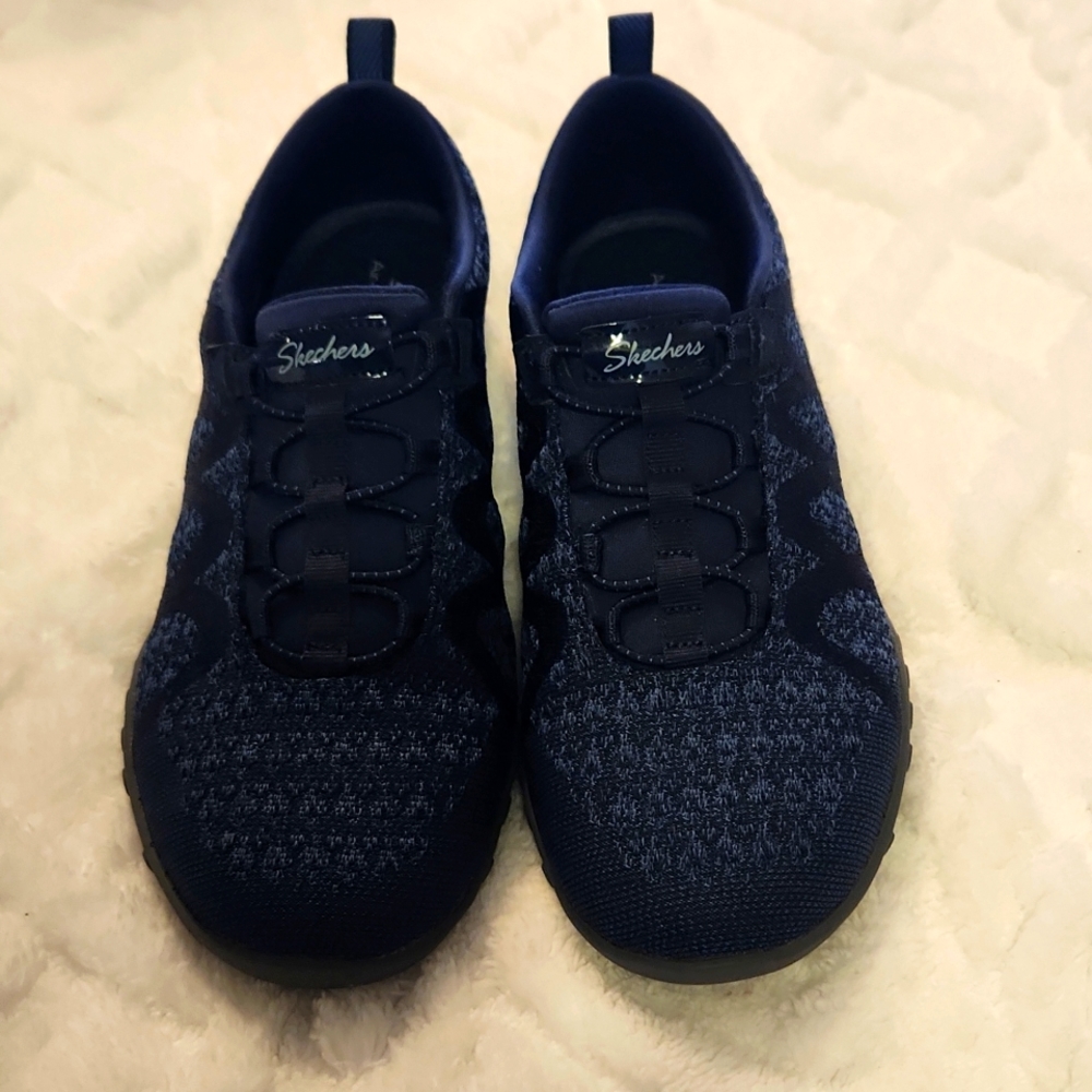 Sketches air cooled memory foam sneakers.